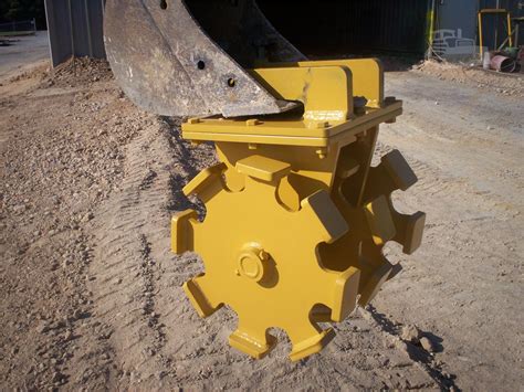 mini excavator on wheels|compactor wheel for excavators.